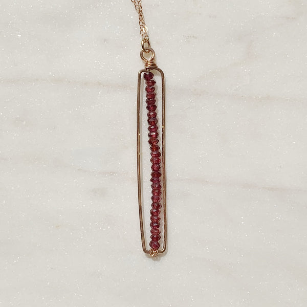 cartouche gemstone pendant