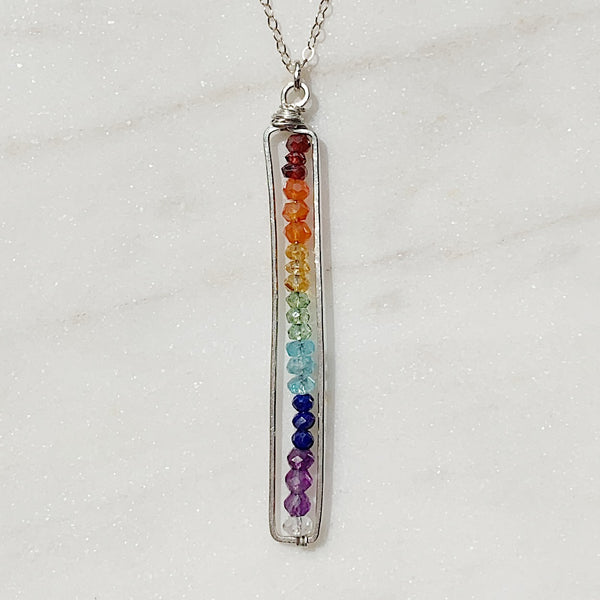 cartouche gemstone pendant