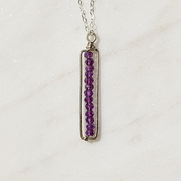cartouche gemstone pendant