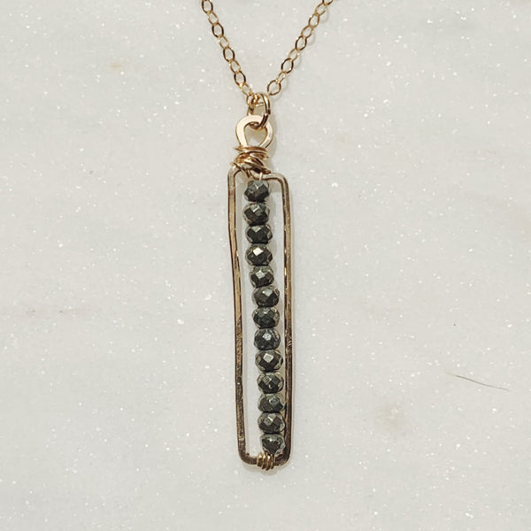 cartouche gemstone pendant