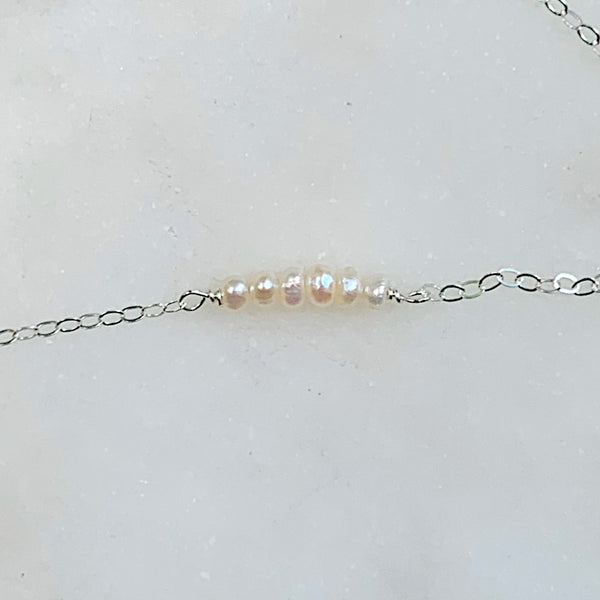 whisper necklace